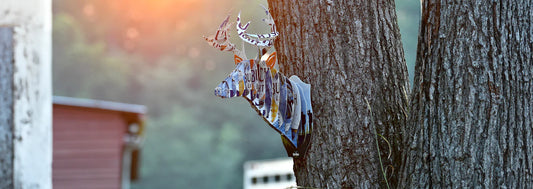 Beer Deer Art Hanging in a Tree